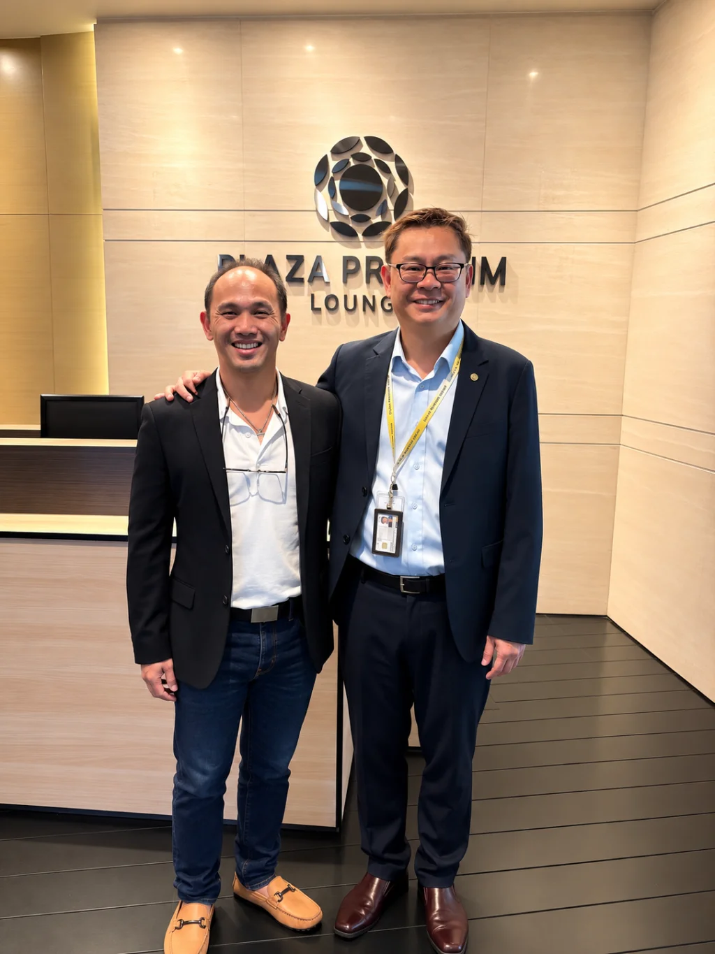 Bliink and Plaza Premium Group representatives at Plaza Premium Lounge, Changi Airport Singapore, marking their partnership